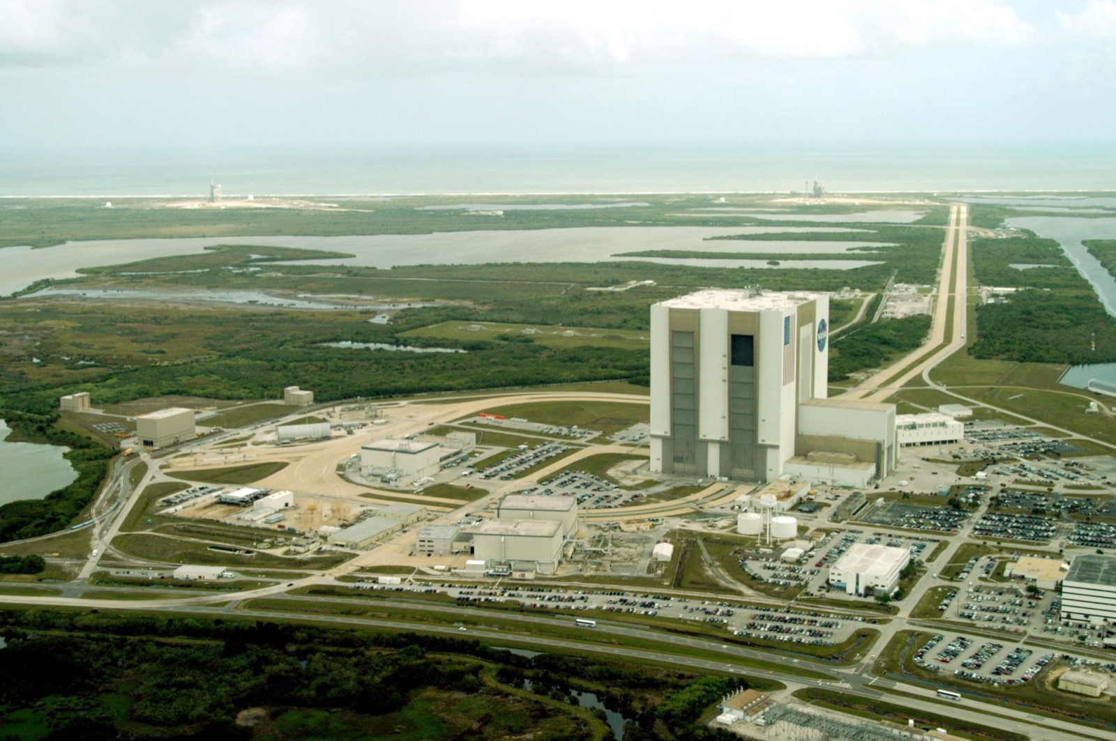 Aerial view of NASA Kennedy Space Center Launch Complex 39 with the Atlantic Ocean visible on the eastern horizon