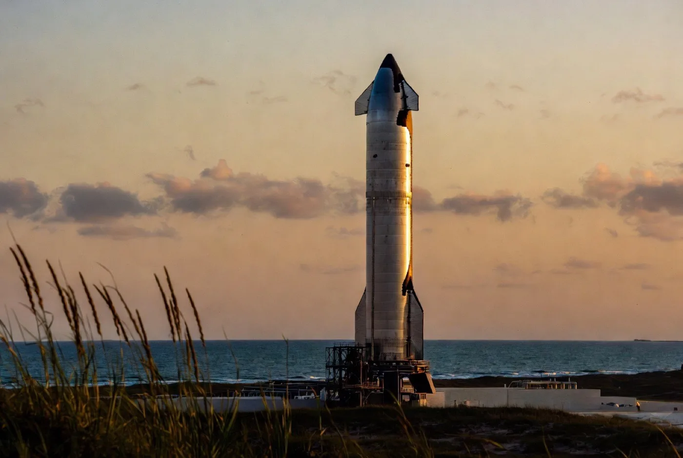 Starship lifting off from Boca Chica, lighting up the South Texas sky
